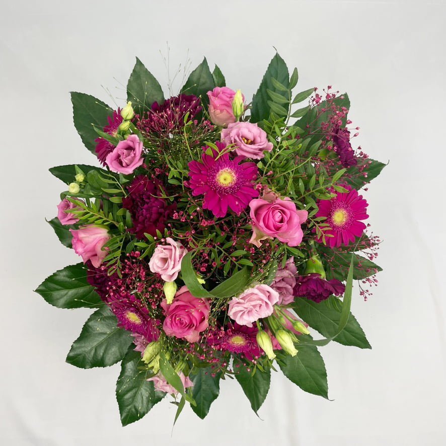Bouquet Emy composé de germinis, rose dans les tons roses et violets