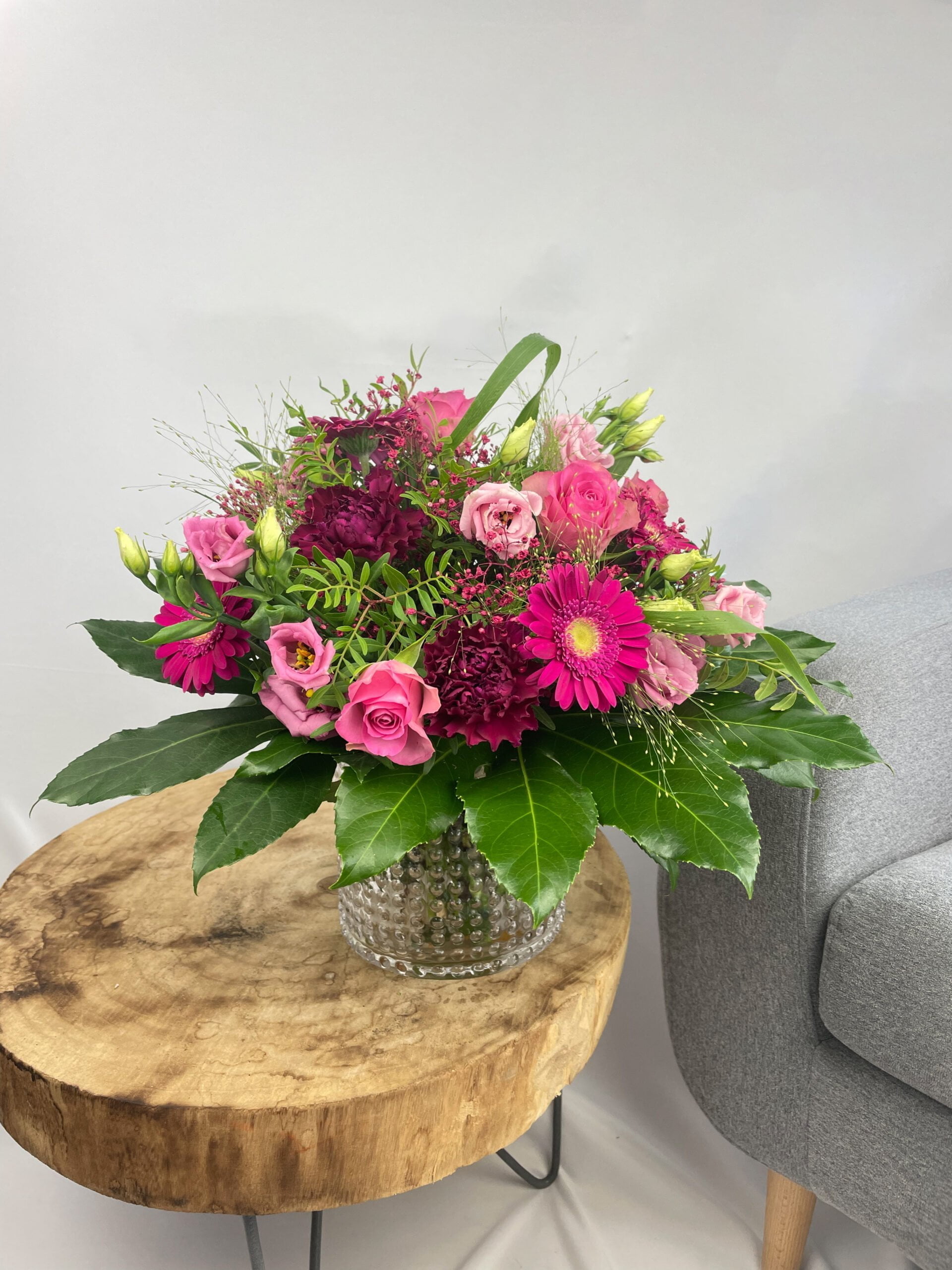 Bouquet Emy composé de germinis, rose dans les tons roses et violets
